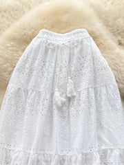 White eyelet tiered maxi skirt with tassel drawstring waist