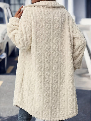 Textured cream shacket-coat with a subtle all-over pattern and collar.