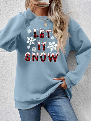 Misty Blue graphic crewneck sweatshirt with "Let It Snow" text and snowflakes.
