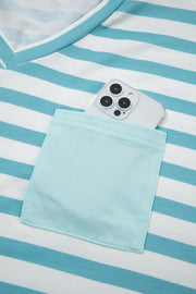 Striped V-neck t-shirt in teal and white with a chest pocket holding a phone.