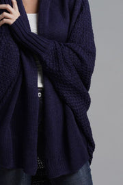 Dark Blue Cocoon Knit Sleeve Cardigan with textured sleeves and ribbed cuffs.