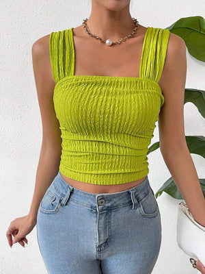 Textured crinkle strap crop top in yellow-green with ruched detail.