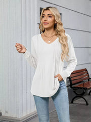 White V-neck long sleeve maternity t-shirt with subtle pintuck detail and relaxed fit.
