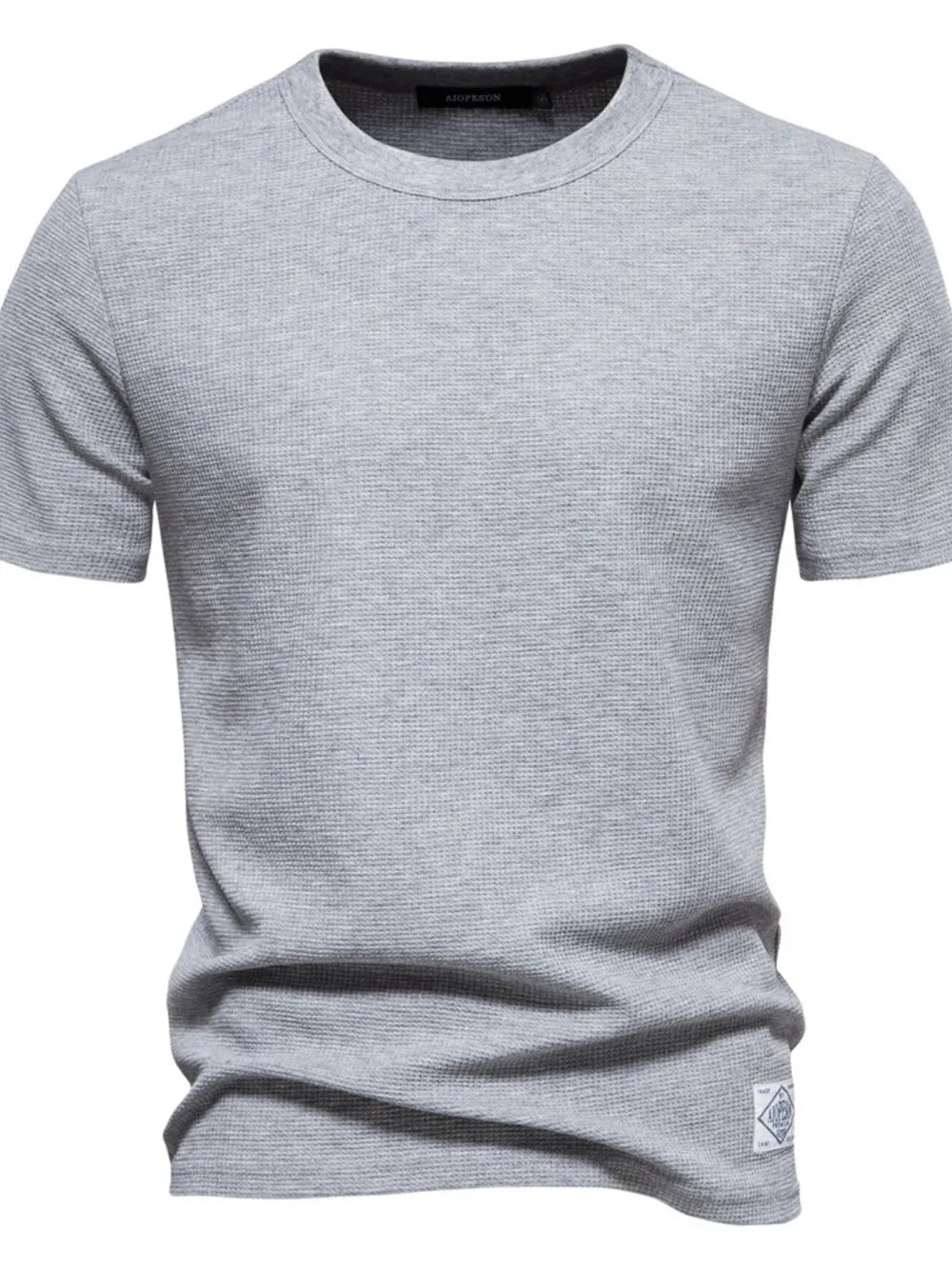 Gray textured crew-neck t-shirt knit with short sleeves and a small logo patch.