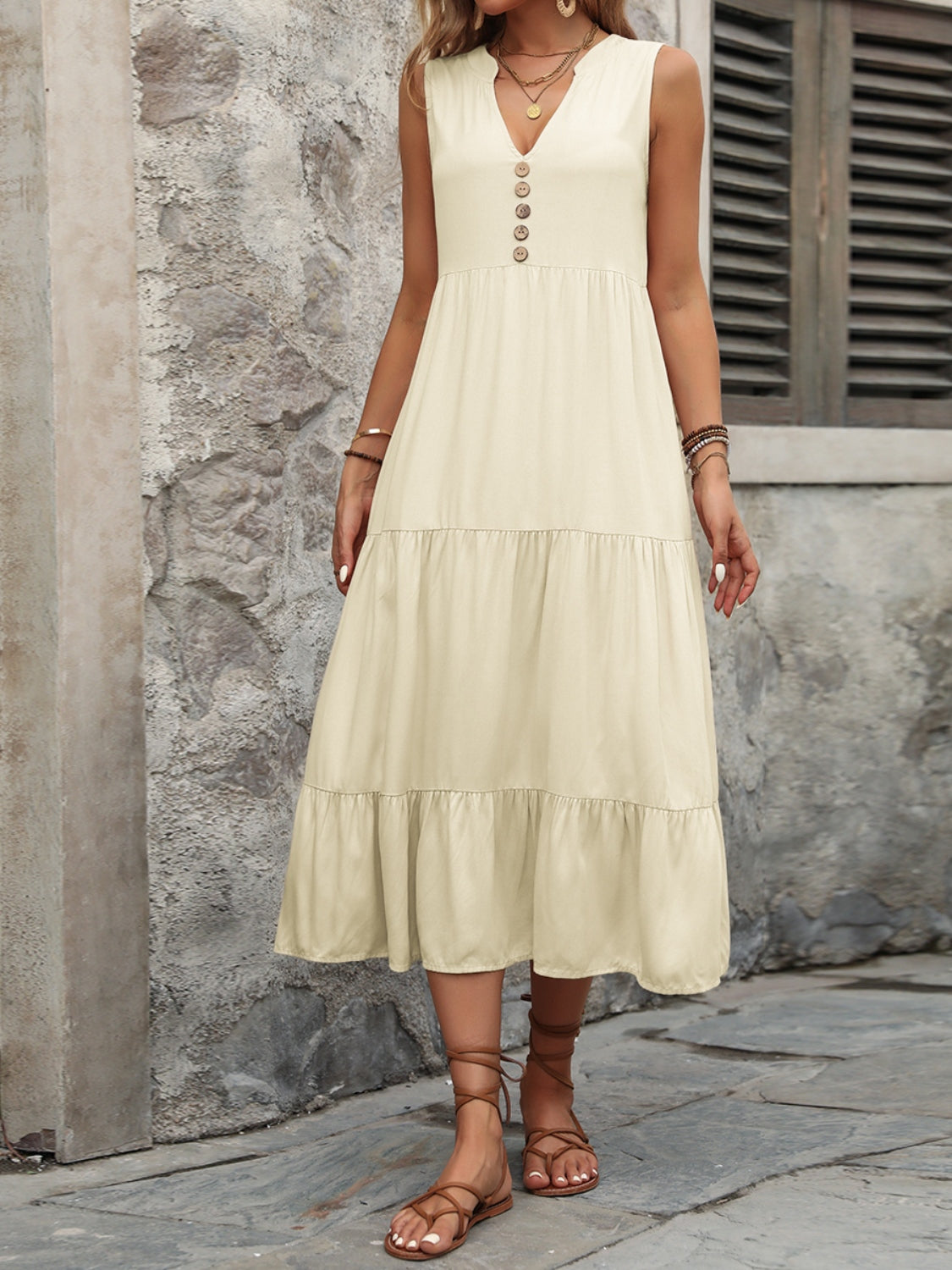 Beige tiered midi sundress with V-neck and button detail