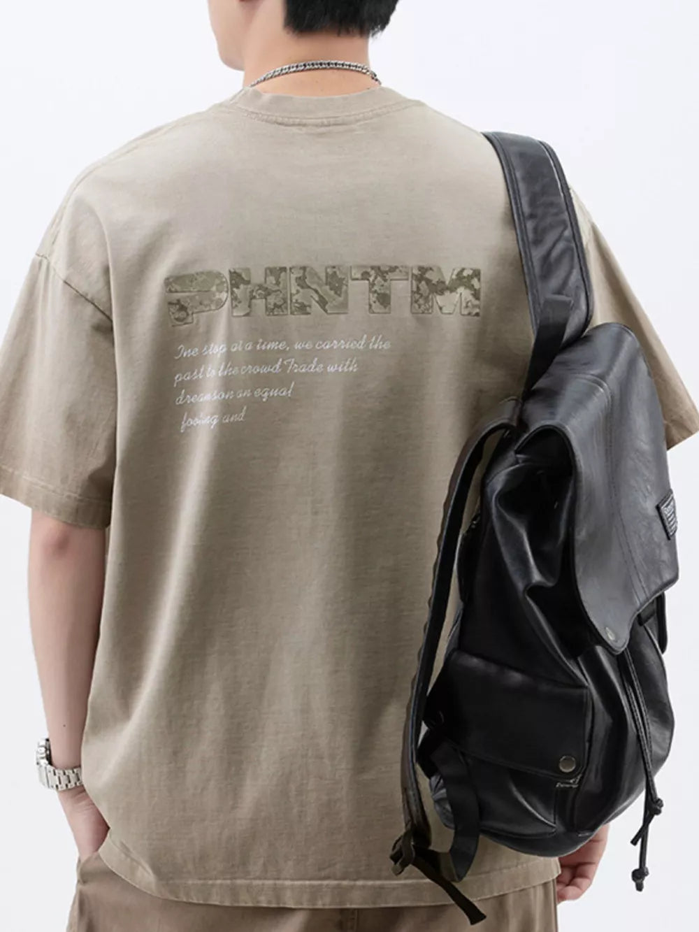 Men's Khaki cotton t-shirt with round neck and letter graphic on back.