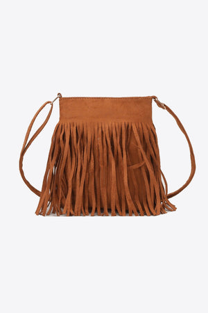 Caramel suede crossbody bag with fringe detail and adjustable strap