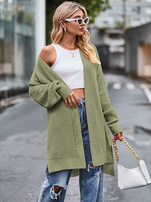 Open-stitch waffle knit duster cardigan in Matcha Green with long sleeves and side slits.