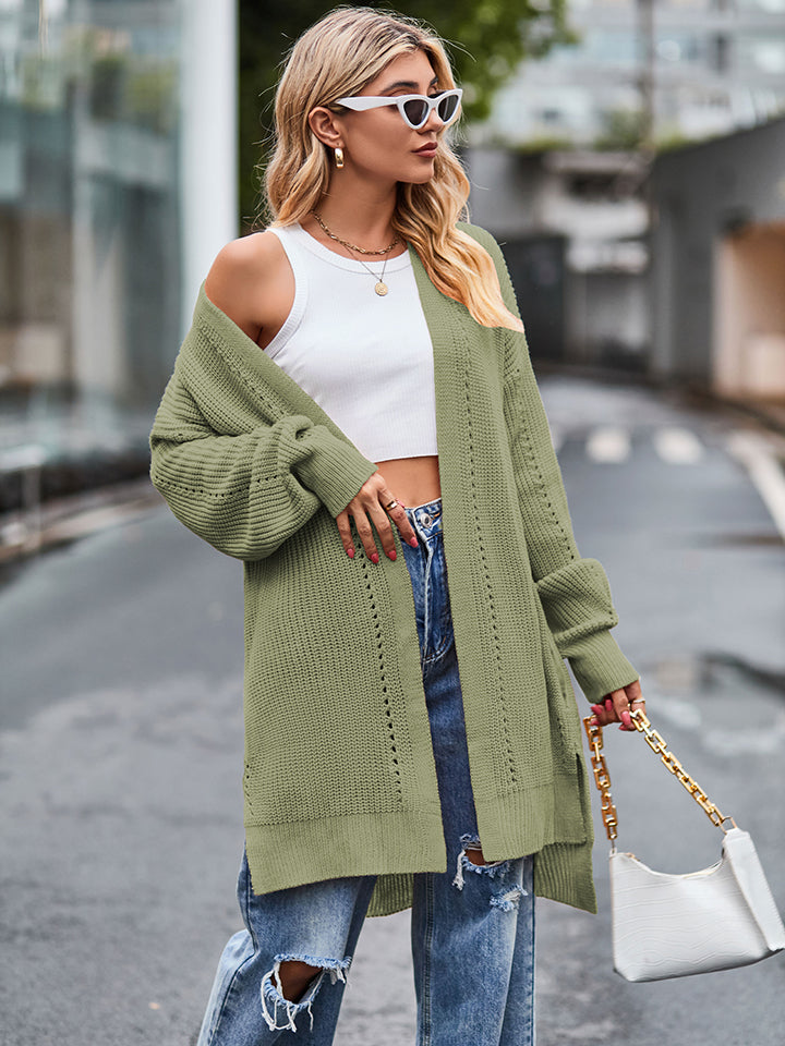Open-stitch waffle knit duster cardigan in Matcha Green with long sleeves and side slits.