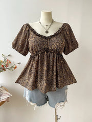 Plus size coffee brown paisley print peasant blouse with ruffled neckline and smocked waist.