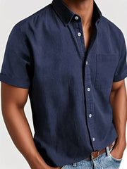 Men's dark blue short sleeve button-down shirt with chest pocket