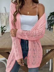 Pink openwork diamond knit duster cardigan with long sleeves and open front.