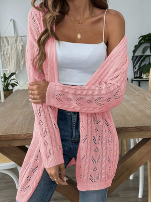 Pink openwork diamond knit duster cardigan with long sleeves and open front.