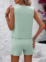 Light green ribbed tank top and shorts set with vertical stripes.