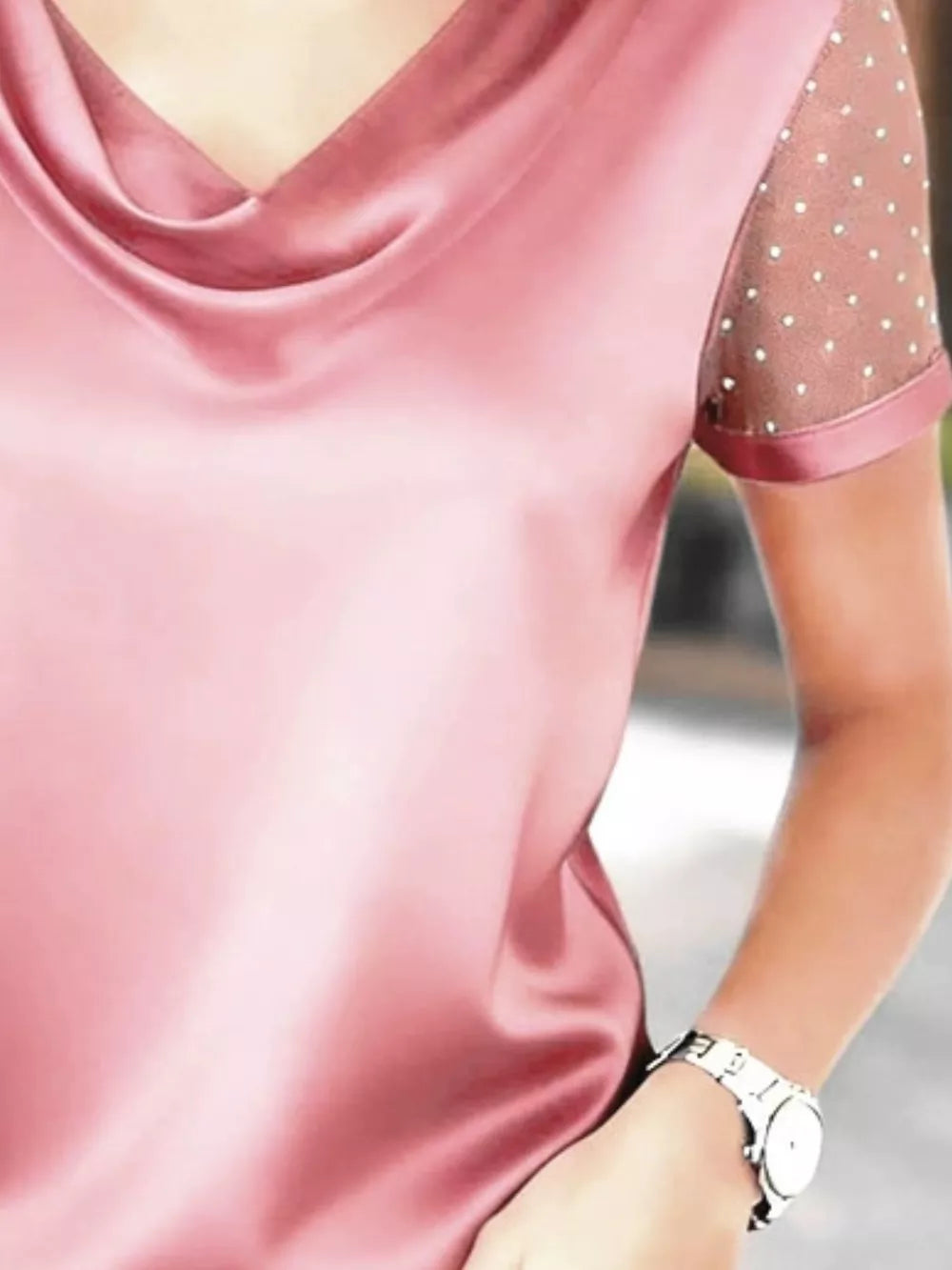 Pink cowl neck blouse with sheer polka dot sleeves and satin trim.