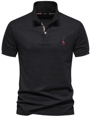 Black piqué polo shirt with giraffe embroidery and striped collar detail.