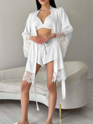 White lace trim three-piece loungewear set with robe, bralette, and drawstring shorts.