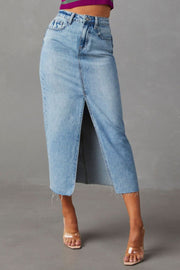 Light blue denim midi skirt with slit front and raw hem