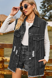 Dark distressed denim sleeveless jacket with frayed hem and button front.