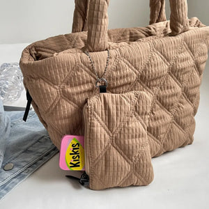 Quilted shopper tote bag in Coffee Brown with matching zippered pouch and chain detail.