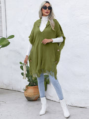 Matcha green textured knit poncho with fringe and wooden buttons, V-neck, open front.