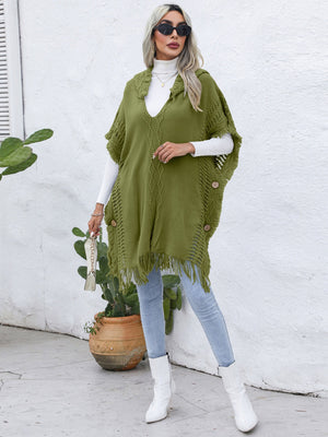 Matcha green textured knit poncho with fringe and wooden buttons, V-neck, open front.