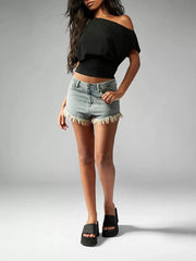 Black asymmetrical crop t-shirt with draped fit and off-the-shoulder neckline.