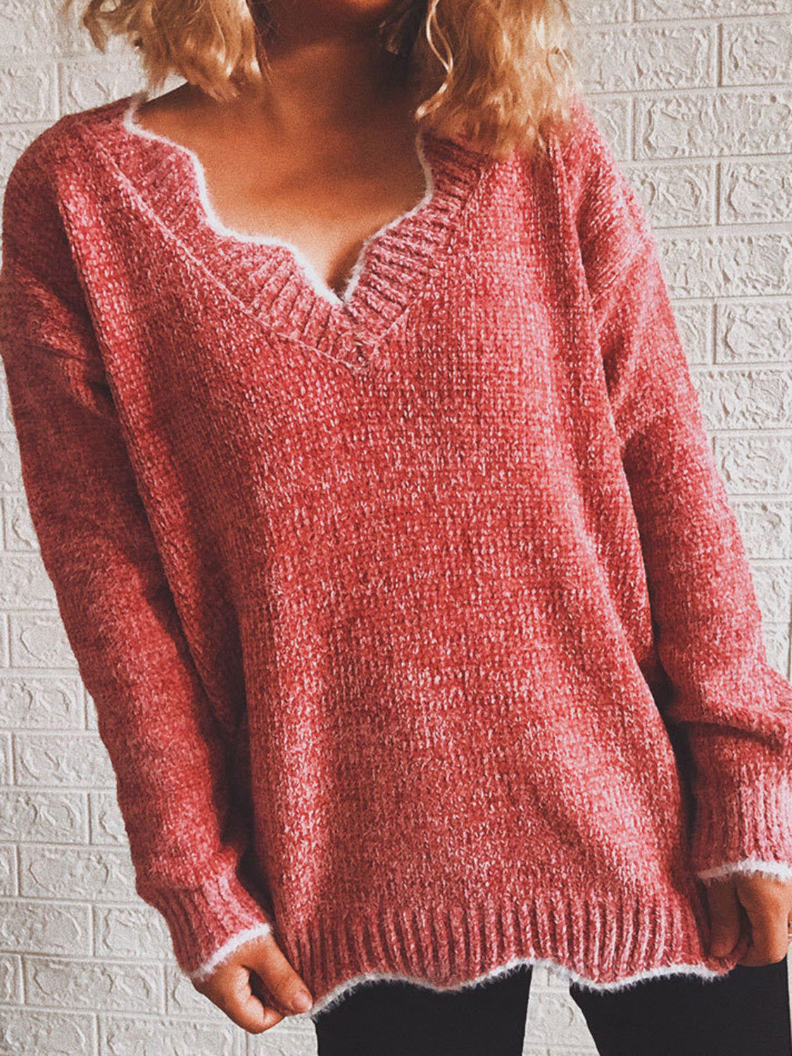 Red orange acrylic knit sweater with scalloped trim V-neck and ribbed cuffs and hem.
