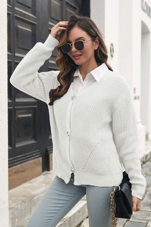 Chunky knit button-through cardigan in ivory with V-neck and long sleeves.