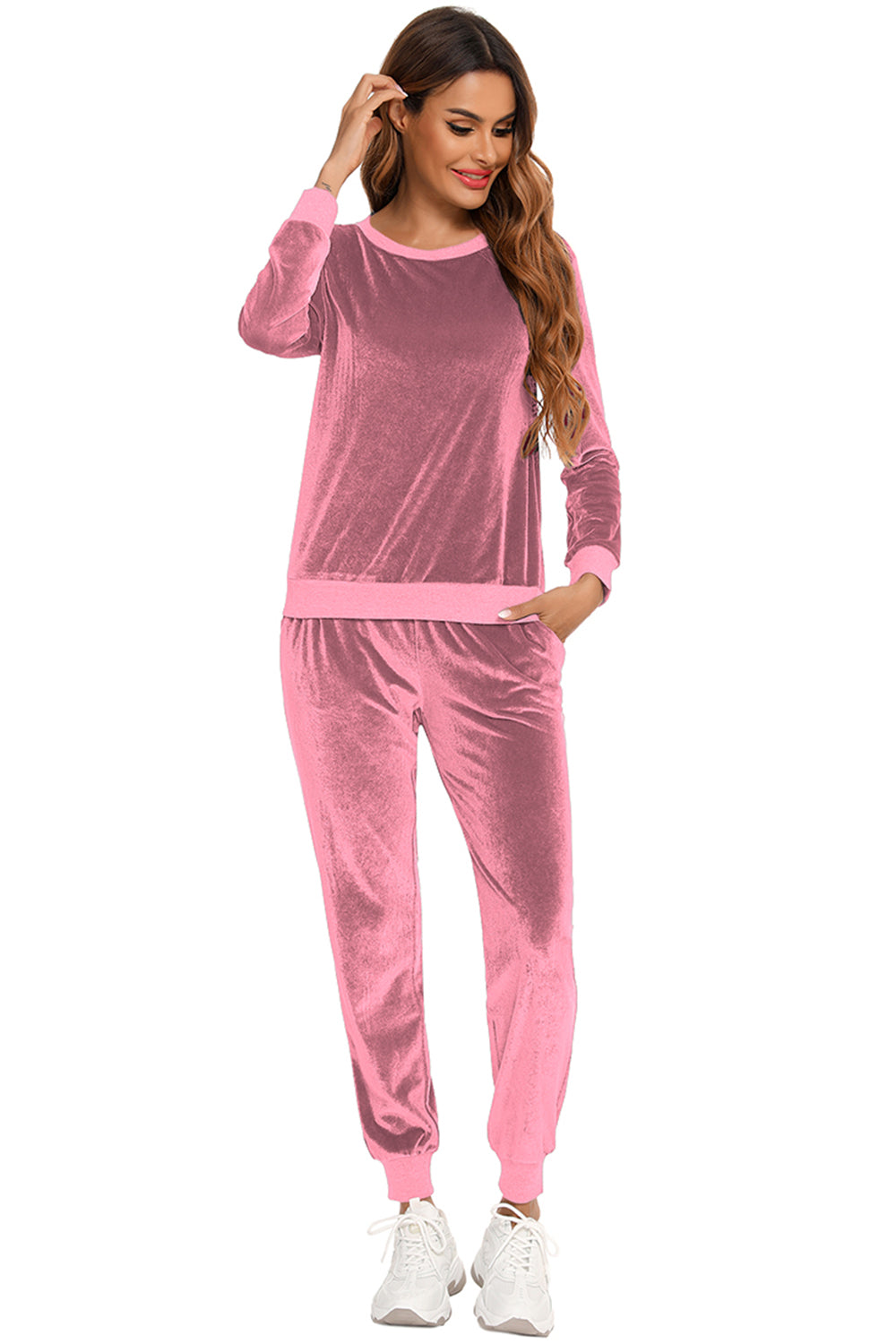 Dusty pink velvet lounge set with contrast trim, crew neck sweatshirt and jogger pants.