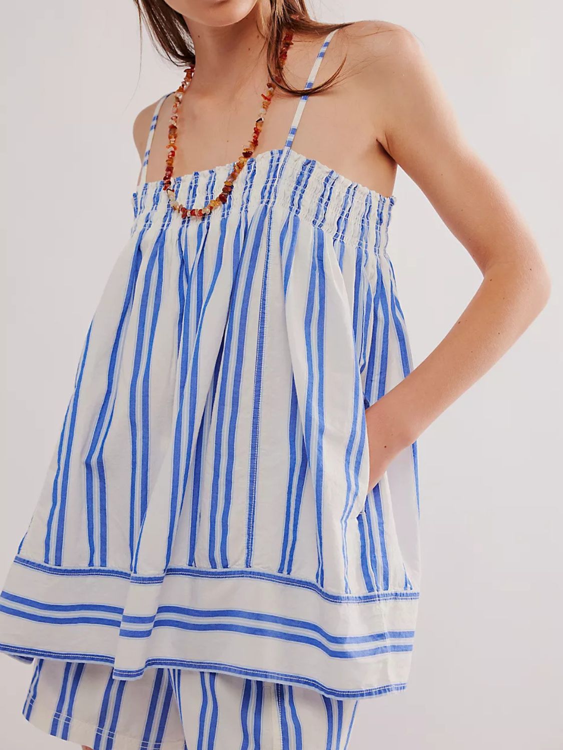 Blue striped smocked cami and shorts set with a relaxed fit and pockets.