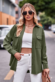 Oversized utility shirt in Matcha Green with two chest pockets and a relaxed fit.