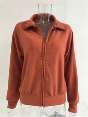 Orange ribbed knit jacket with full zip and collar