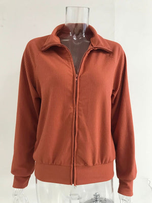 Orange ribbed knit jacket with full zip and collar