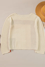 Beige crochet knit sweater with an ombre effect and open knit panels.