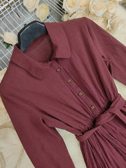 Red belted maternity maxi dress with button front and tie waist.