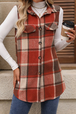 Plaid utility vest in terracotta with button front and patch pockets.