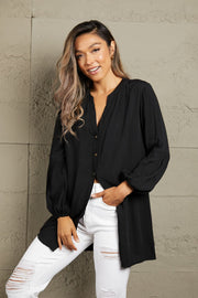 Black oversized mandarin collar blouse with balloon sleeves and button front