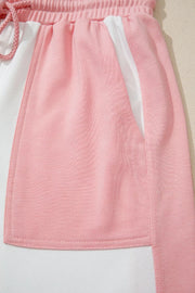 Color block cotton lounge set with pink and white panels and a drawstring waist.