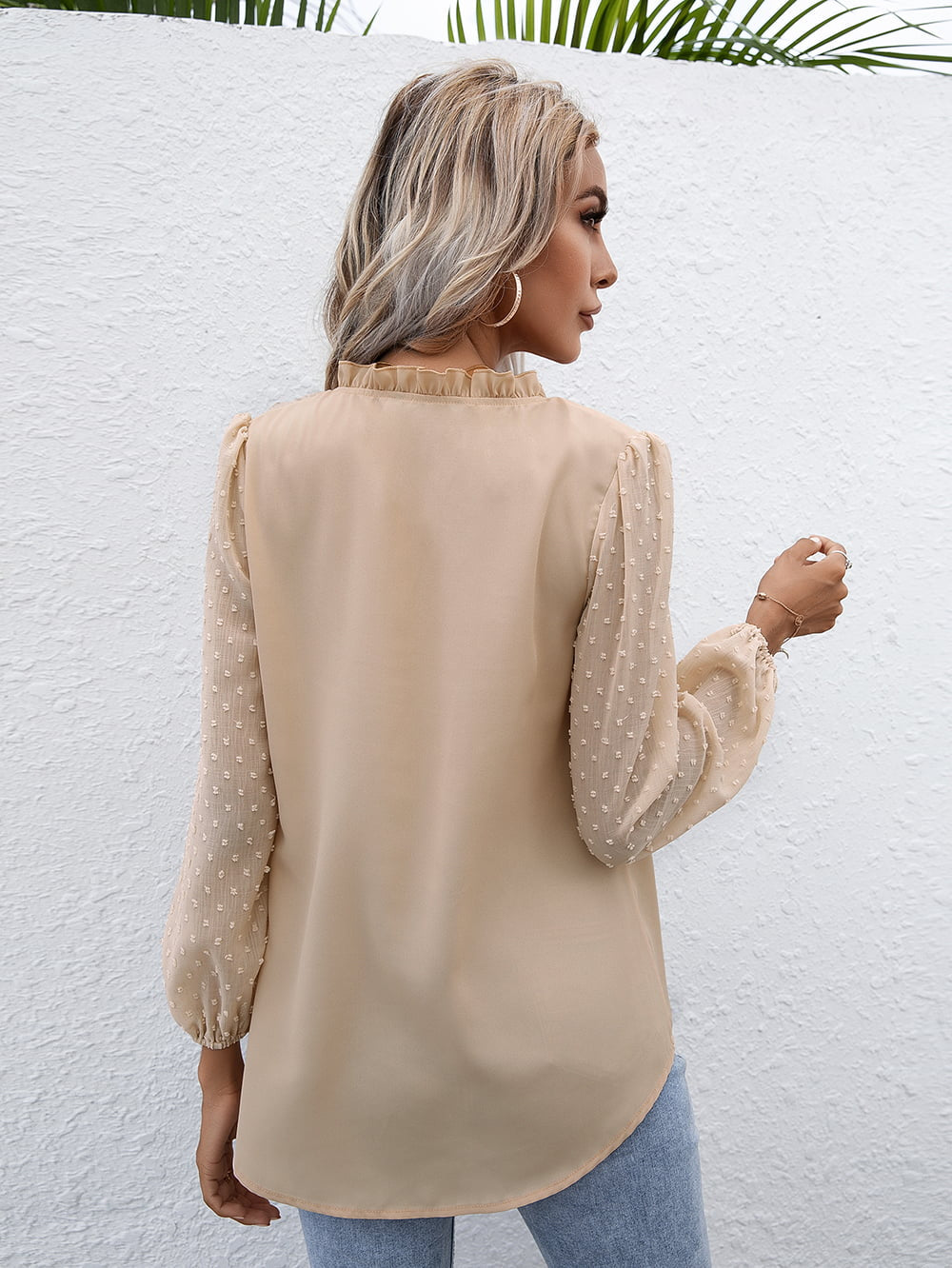 Khaki Swiss dot sleeve gathered blouse with ruffled neckline and balloon sleeves.