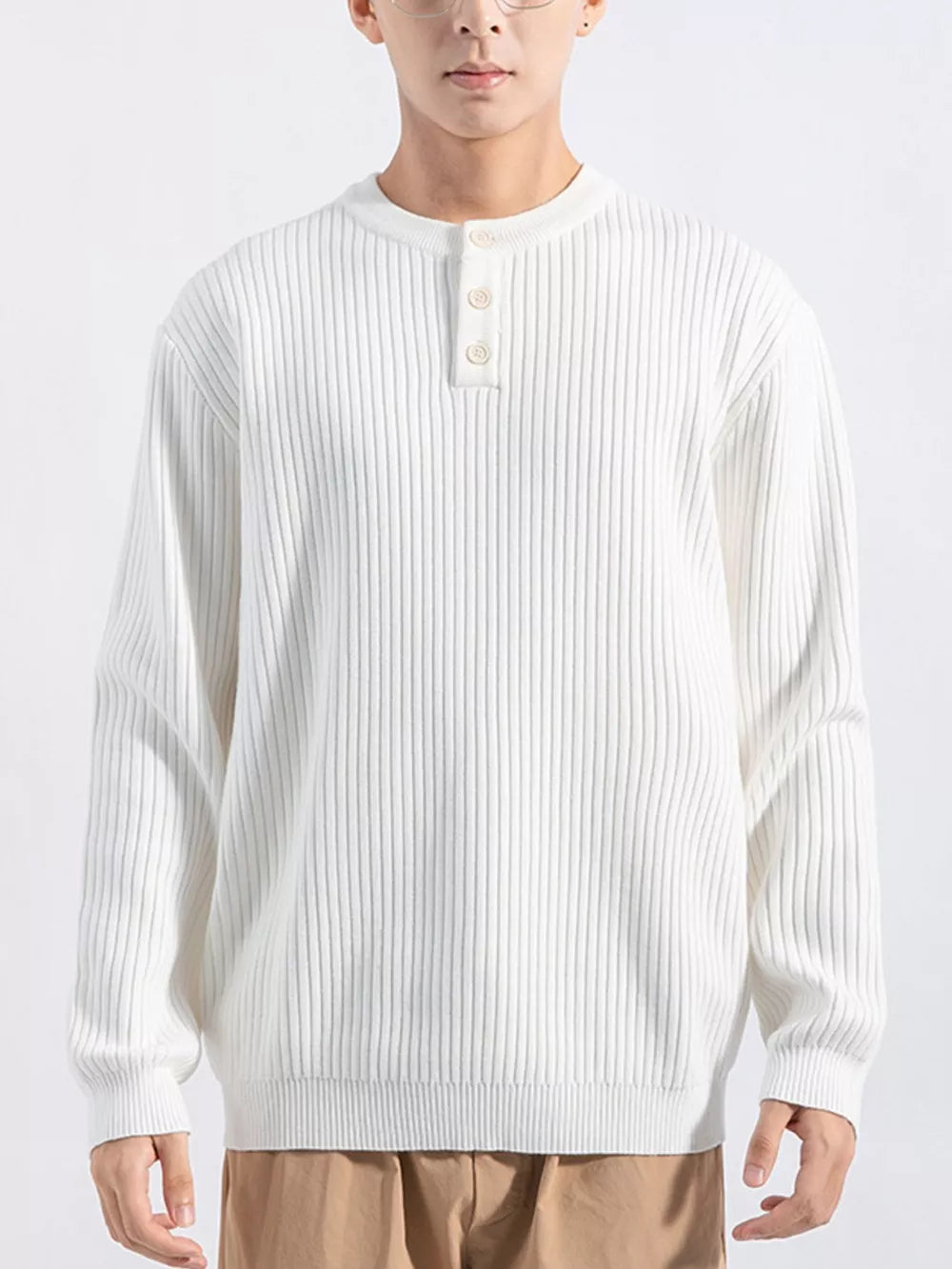 Men's white ribbed knit top with button detail and crew neck.