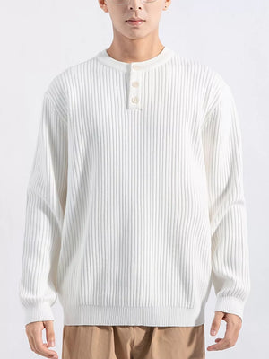 Men's white ribbed knit top with button detail and crew neck.