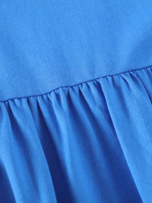 Blue cotton baby dress with ruffled hem detail
