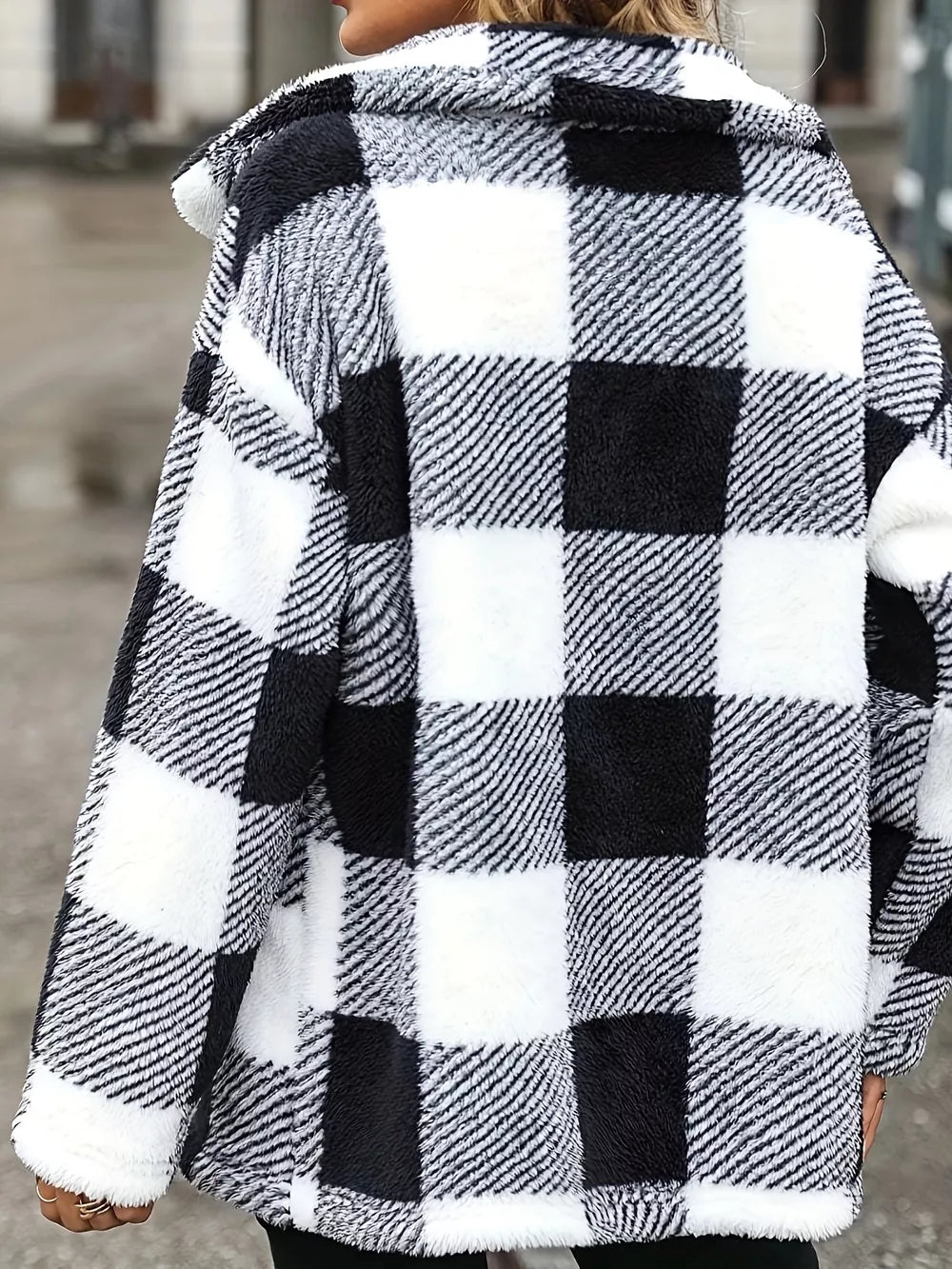 Cozy Sherpa trench coat with black and white buffalo plaid pattern and classic collar.