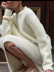 Cozy knit sweater in pastel yellow with relaxed fit, crew neck, and long sleeves.