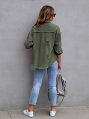 Moss green distressed denim shacket with frayed hem and cuffs.