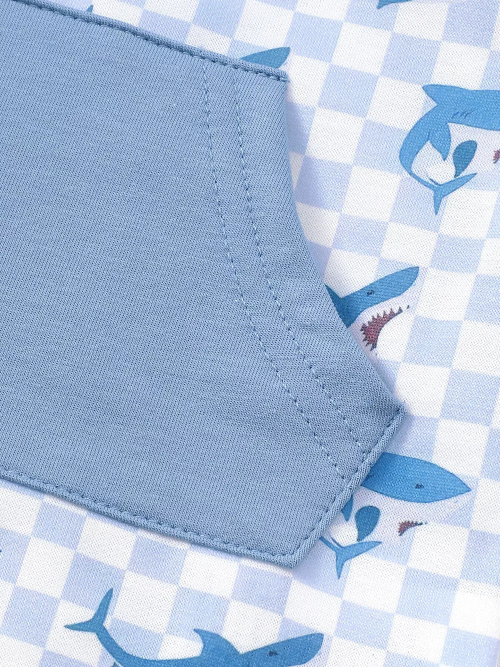 Blue baby hoodie set with checkered pattern and shark graphic detail.