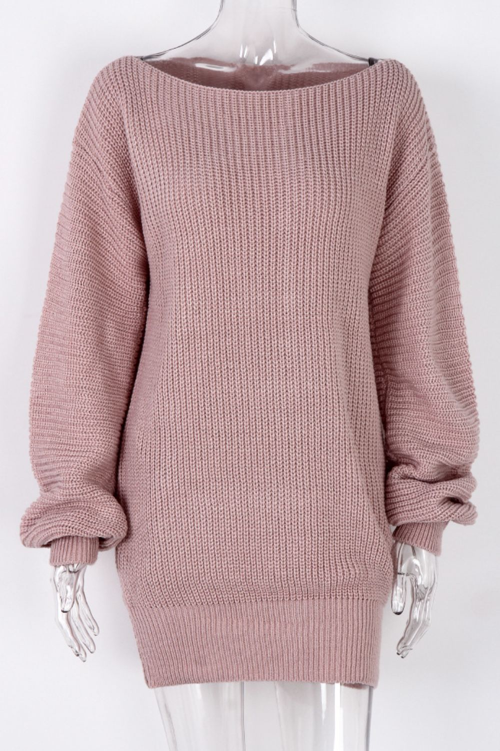 Off-the-shoulder ribbed knit mini dress in blush pink with a boat neckline and long sleeves.
