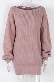 Off-the-shoulder ribbed knit mini dress in blush pink with a boat neckline and long sleeves.