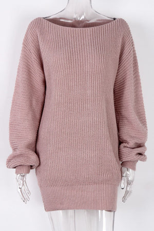 Off-the-shoulder ribbed knit mini dress in blush pink with a boat neckline and long sleeves.